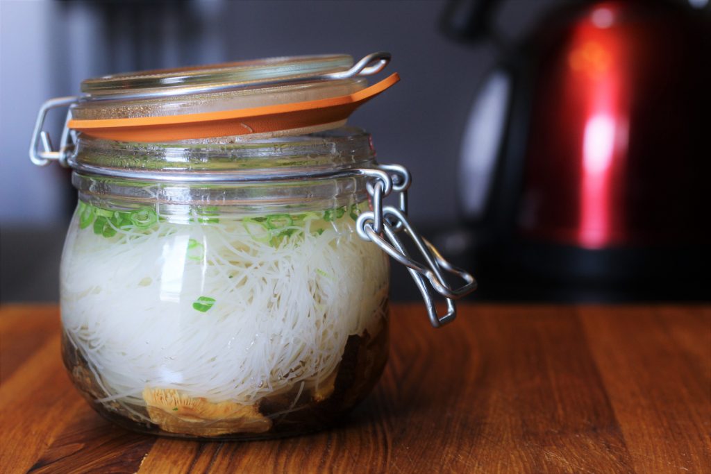 A noodles jar with boiling water added.