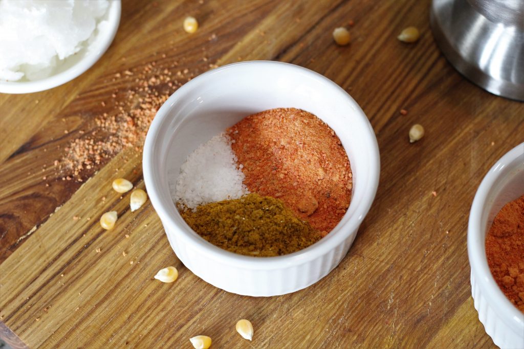 carrot powder, curry powder, and salt in a bowl