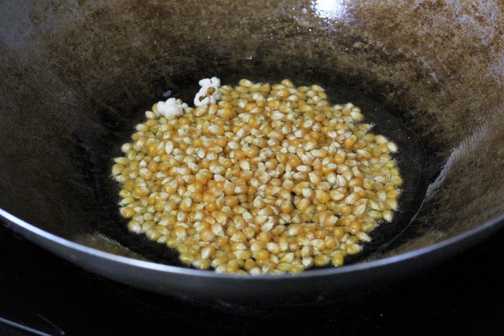 remaining popcorn kernels added to the pan