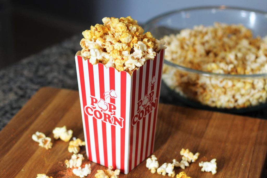 finished popcorn in a movie theater style popcorn container