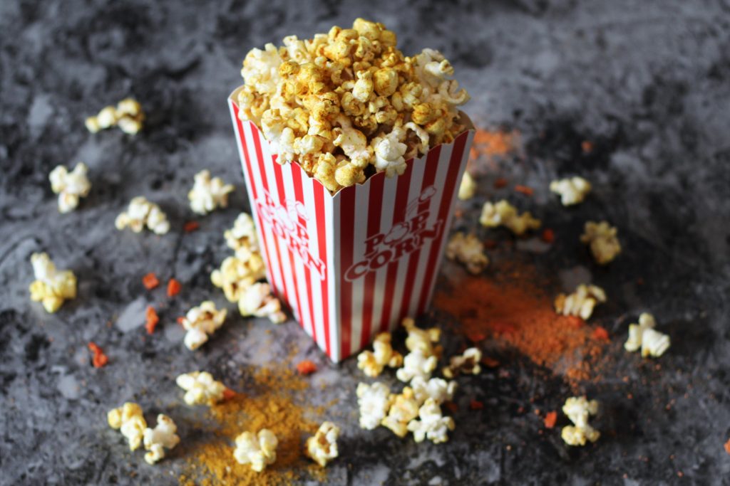 finished popcorn in a movie theater style popcorn container