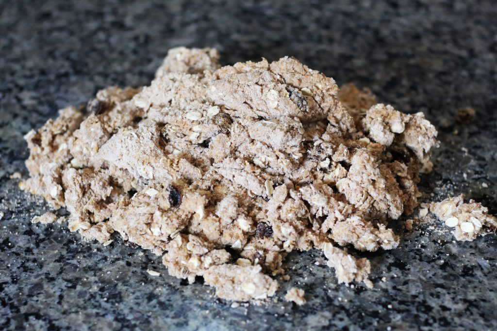 Dough turned out onto a surface for kneading.