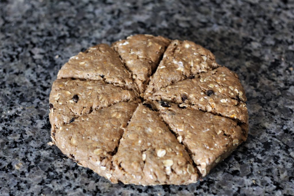 The dough divided into 8 triangular pieces.